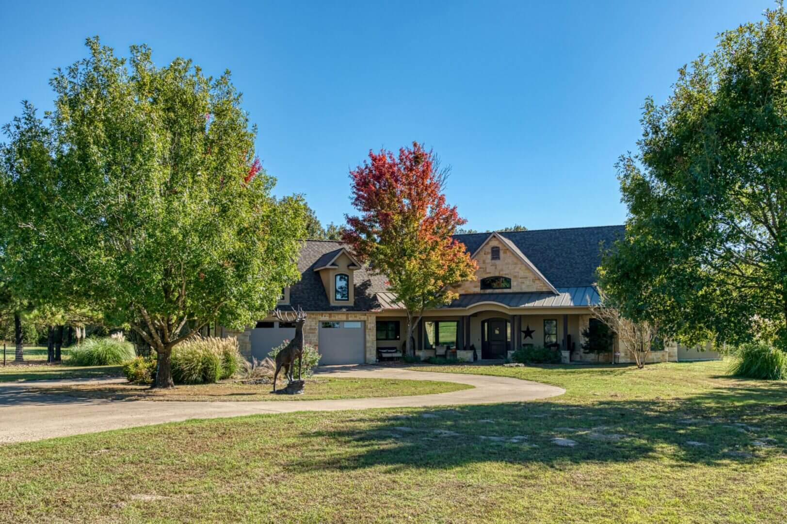 Suburban home surrounded by trees