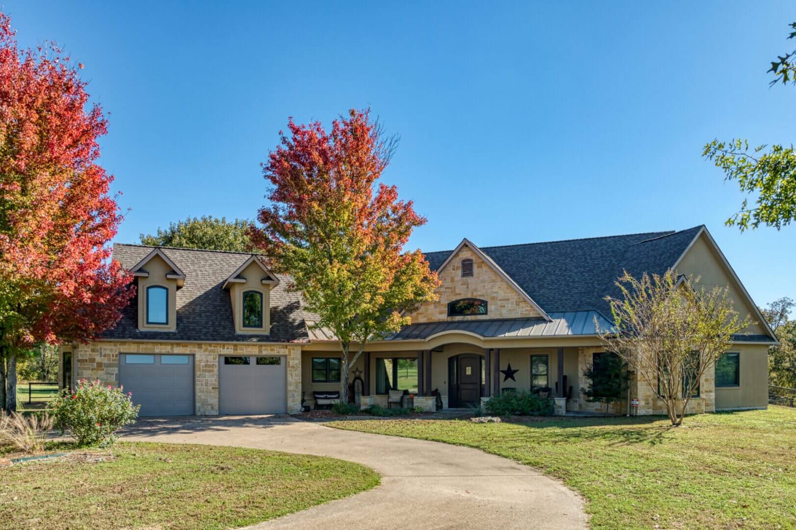 Suburban house with autumn trees