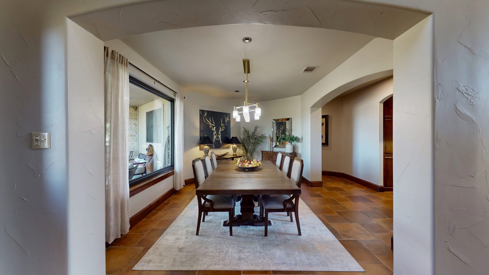 Spacious dining area with chandelier