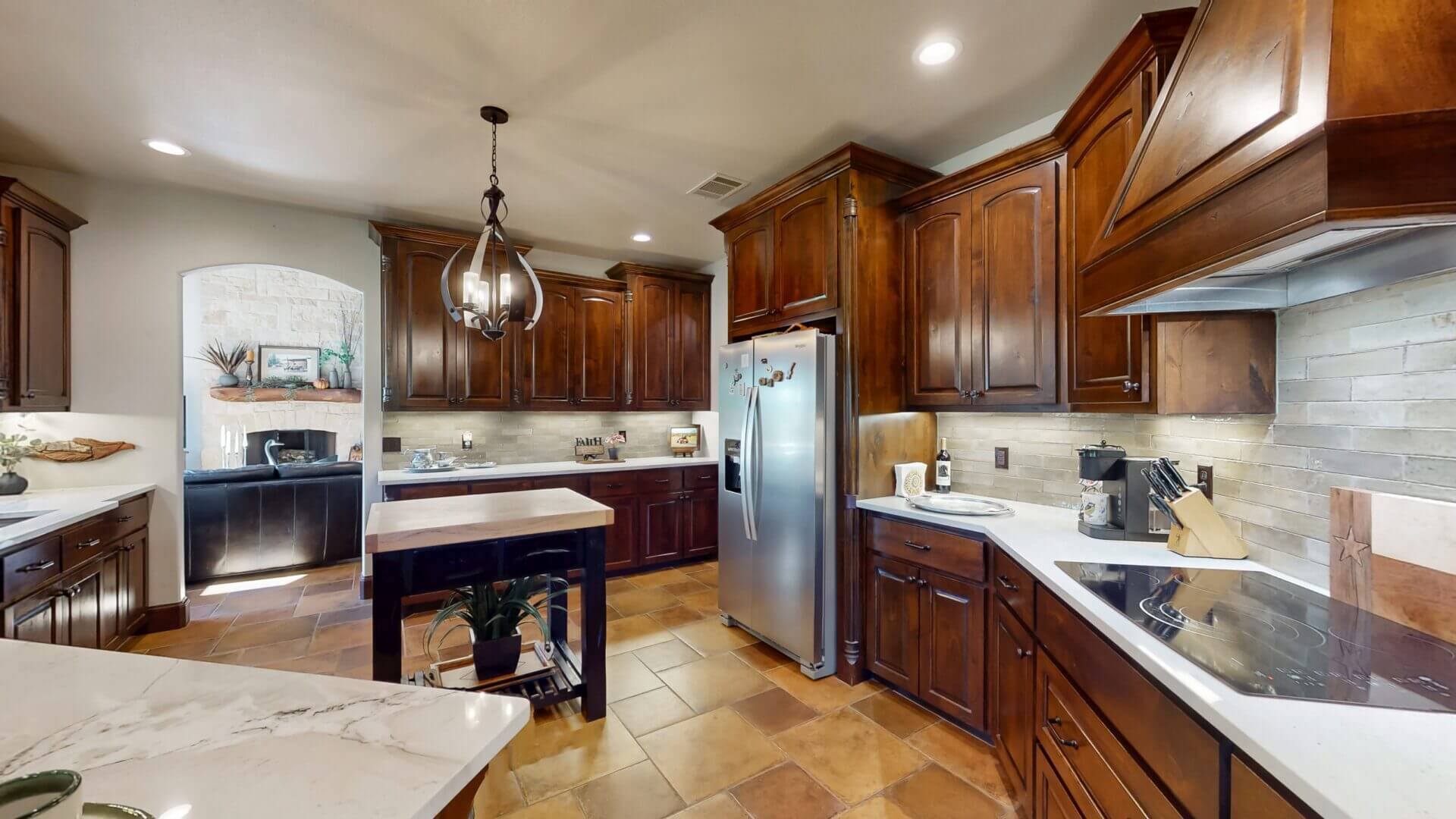 Elegant kitchen design with pendant lighting