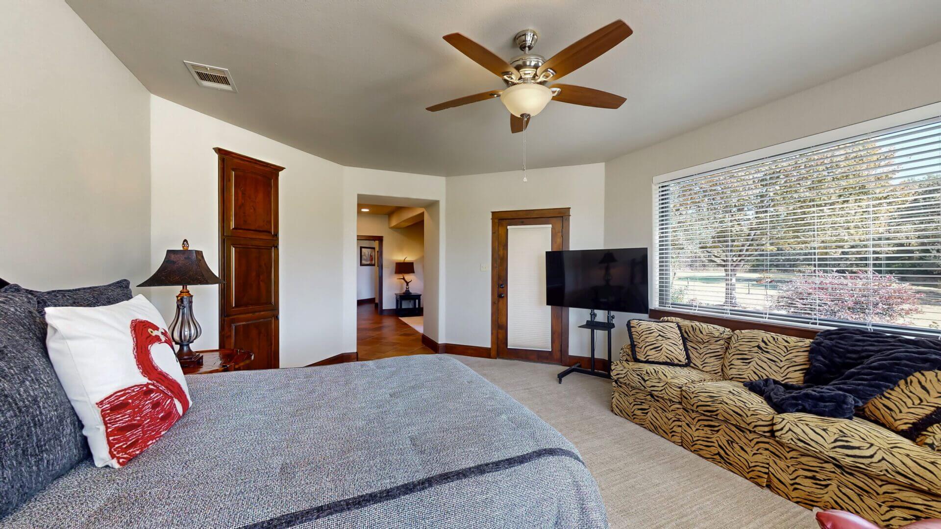 Spacious bedroom with modern decor elements