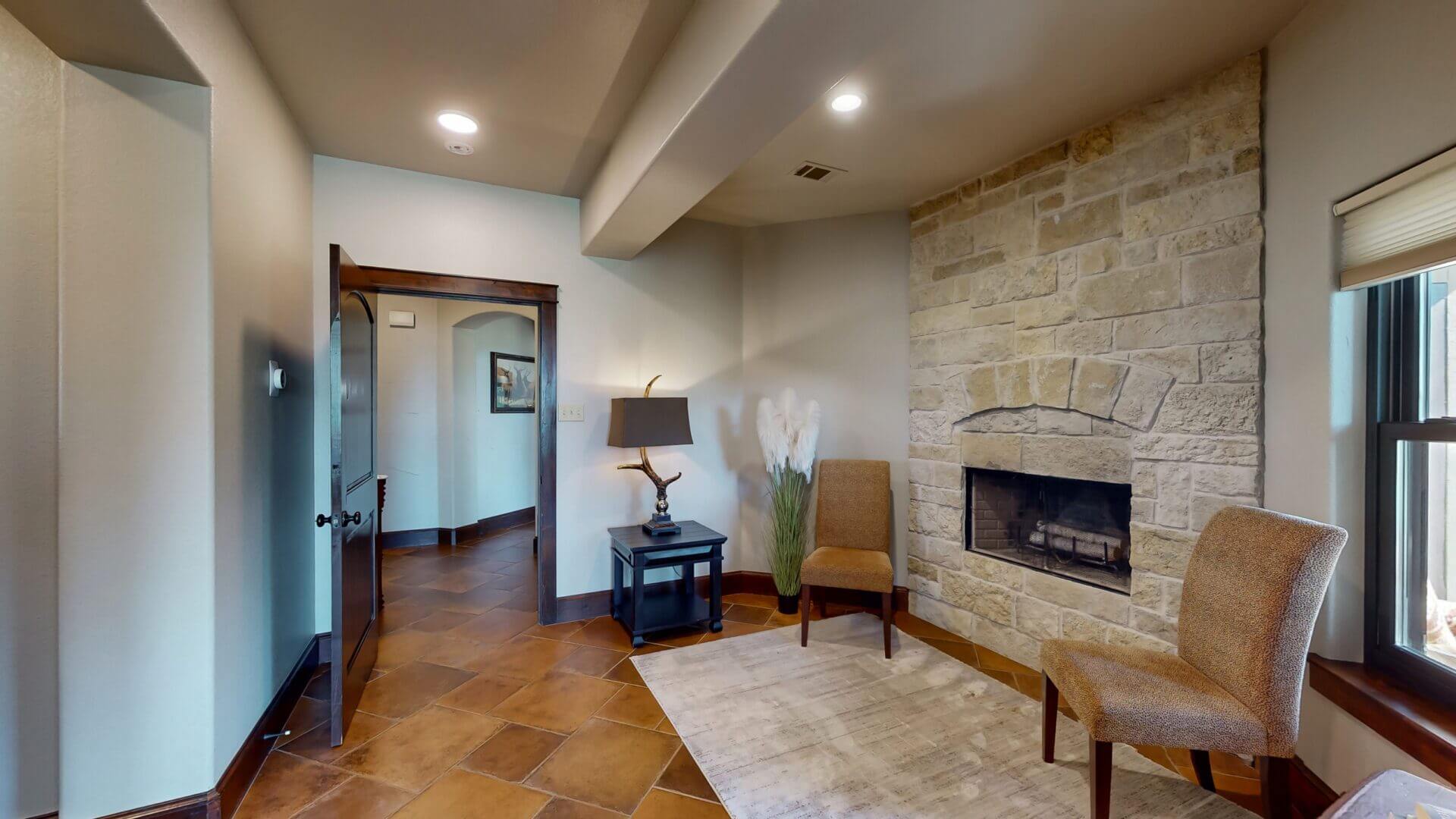 Elegant corner with rug and fireplace