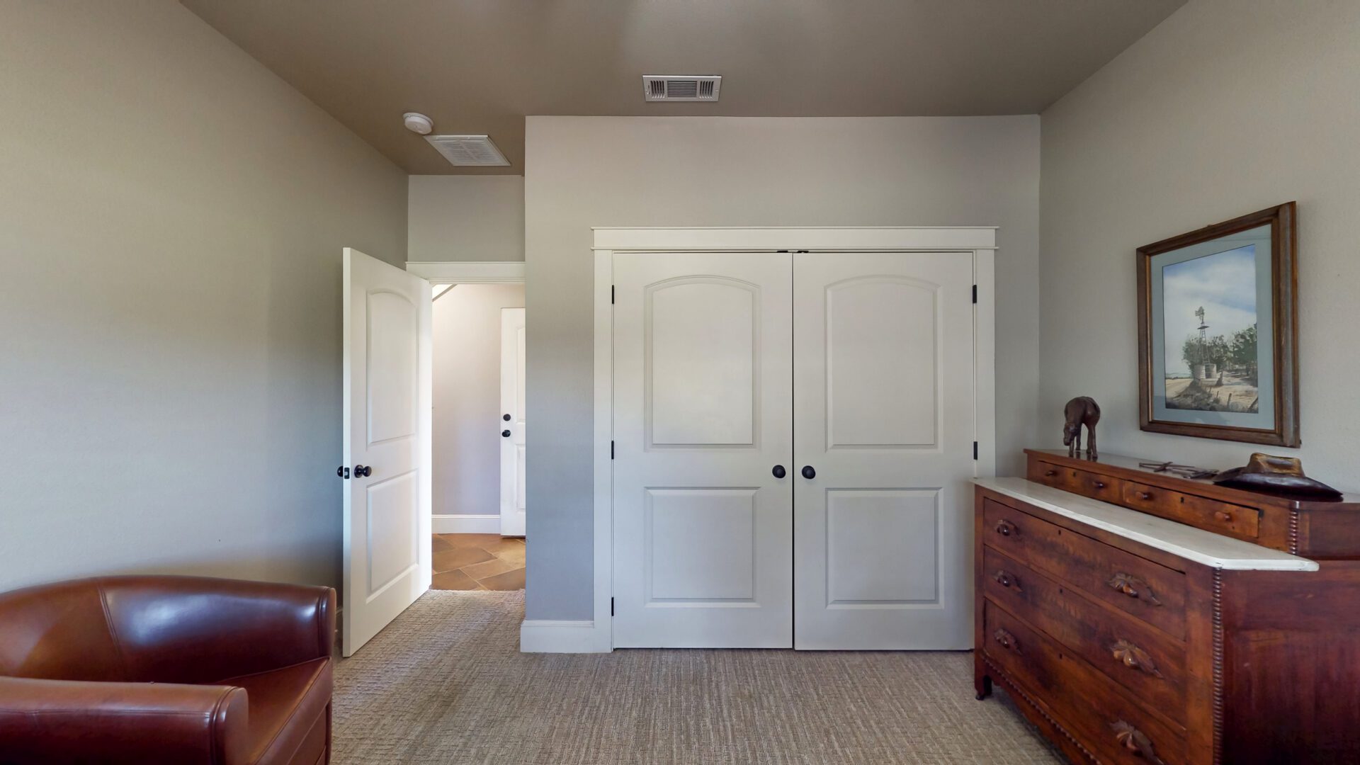Minimalist room with closed closet