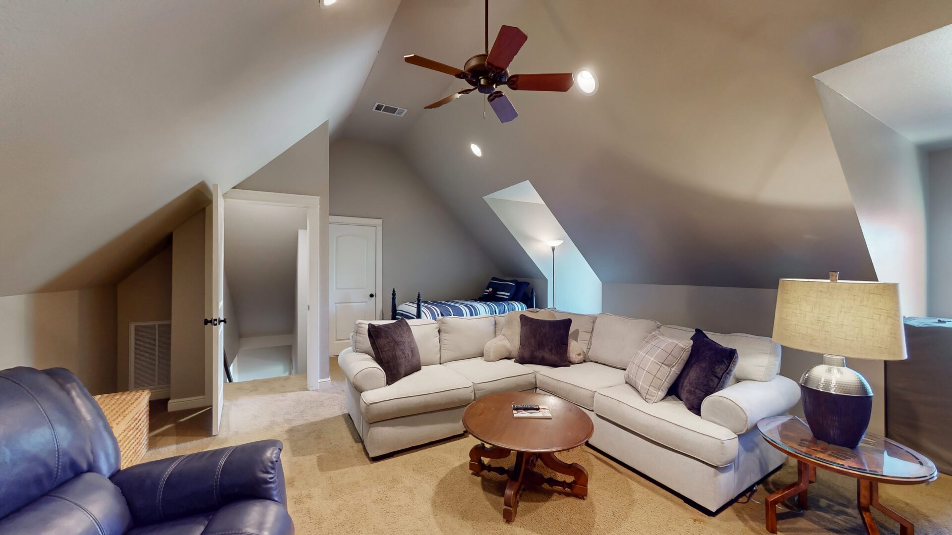 Cozy attic living room with sectional sofa