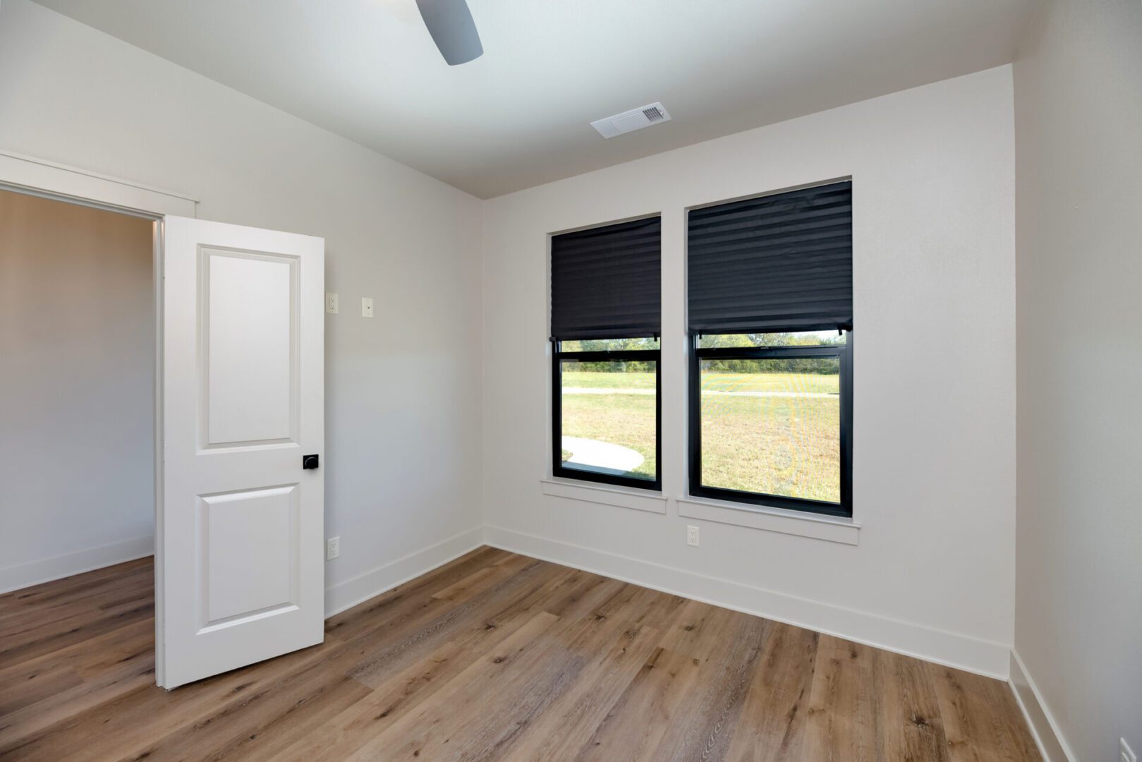 Minimalist room with open door