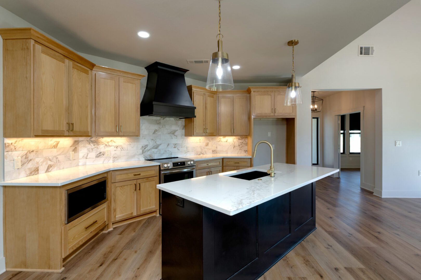 Elegant kitchen design with island lighting