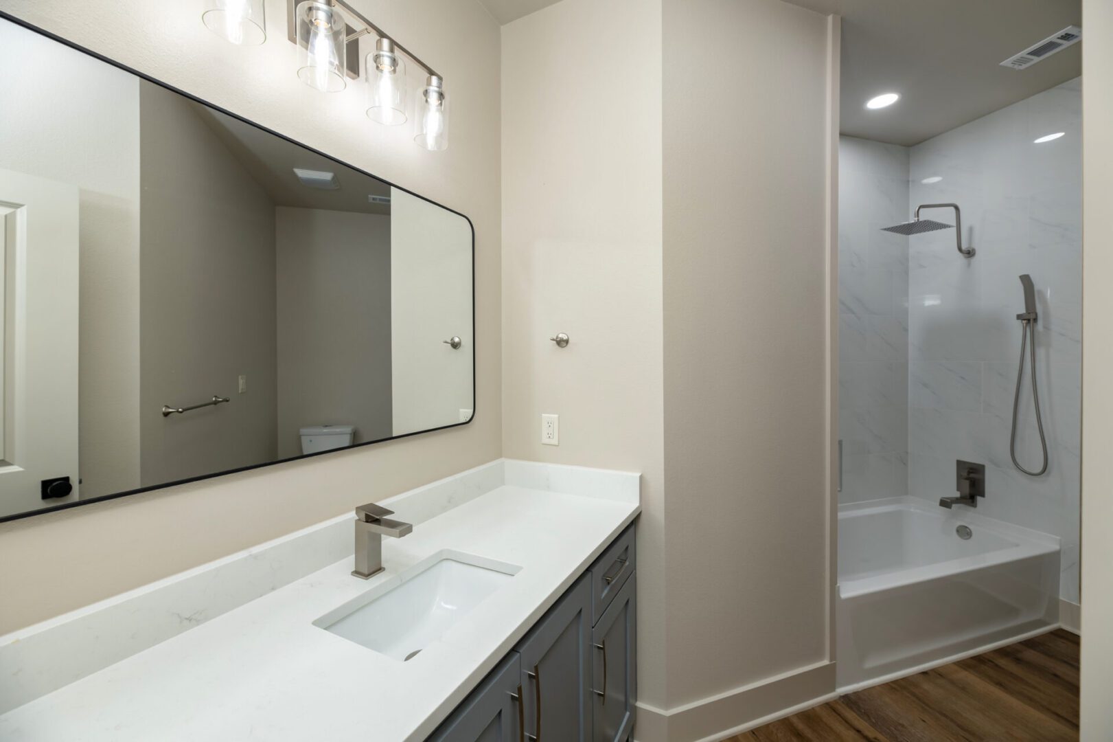 Minimalist bathroom design with bathtub and sink