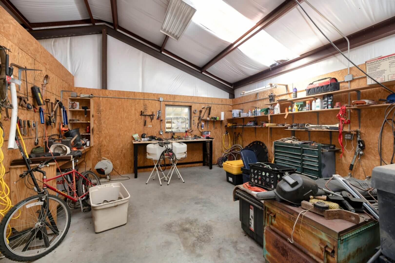 Garage with workbench and scattered tools